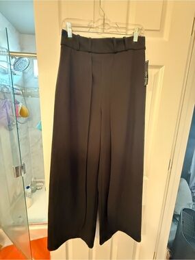 NWT Wide-Leg Black Dress Pants they are wraparound so can show your legs size M